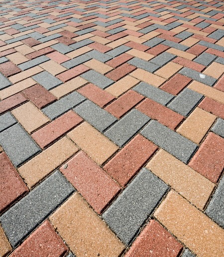 Paver & Stone Cleaning: How to Remove Weeds, Sand Haze, and Mildew Safely
